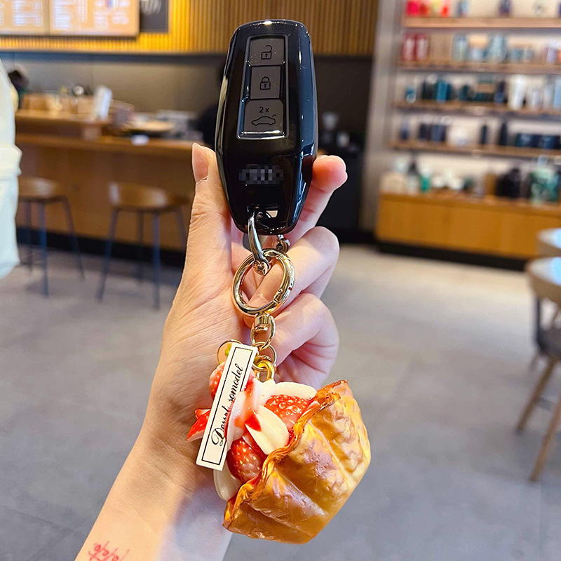 Kreativer PU-Erdbeer-Eierkuche – Carabiner Keychain Bewertung und Preis